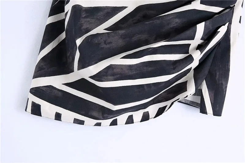 PRINTED DRAPED SKIRT